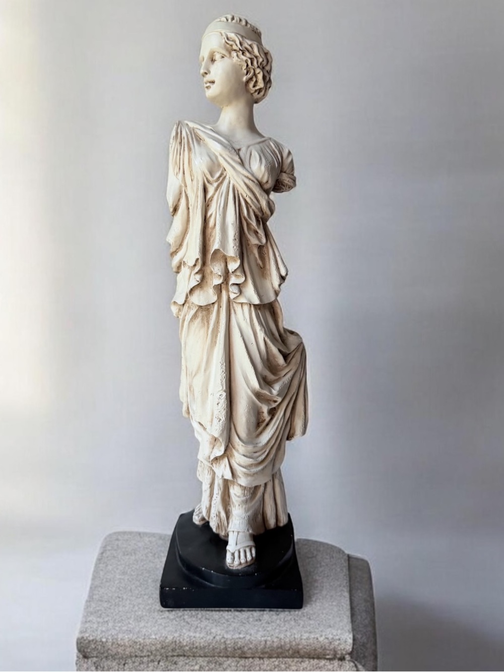 Diana of Gabii the goddess Artemis (Diana) fastening her cloak.Statue sculpture